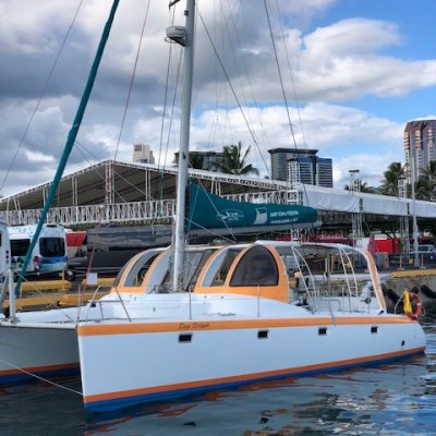 a boat is docked next to a body of water