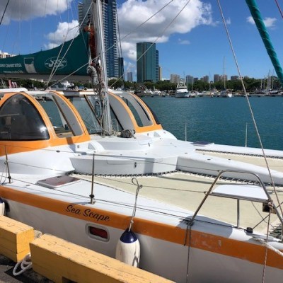 a boat is docked next to a body of water