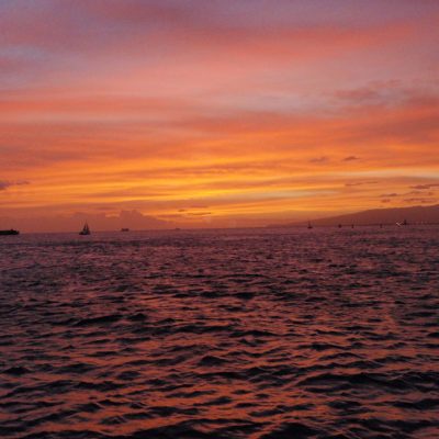 a sunset over a body of water