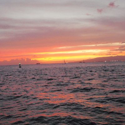 a sunset over a body of water