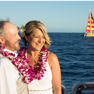 a person standing next to a body of water
