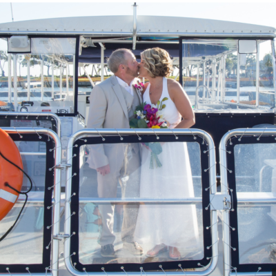 a person standing in front of a bus