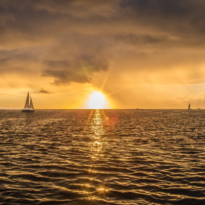 a sunset over a body of water