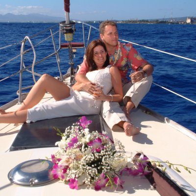 a woman sitting on a boat in the water