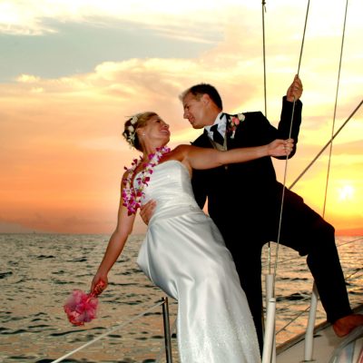 a person standing next to a body of water