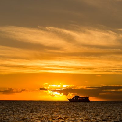 a sunset over a body of water