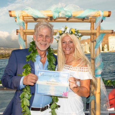 a person standing next to a body of water