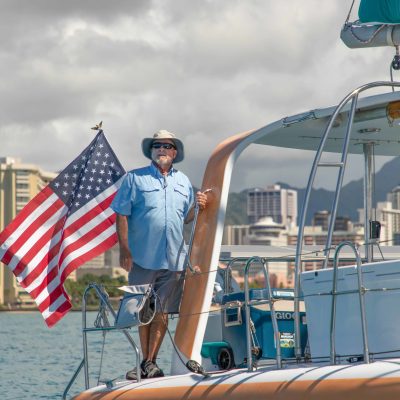 a person riding on the back of a boat