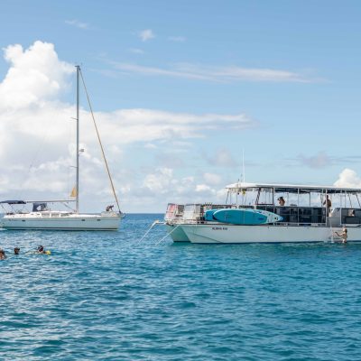 a small boat in a large body of water