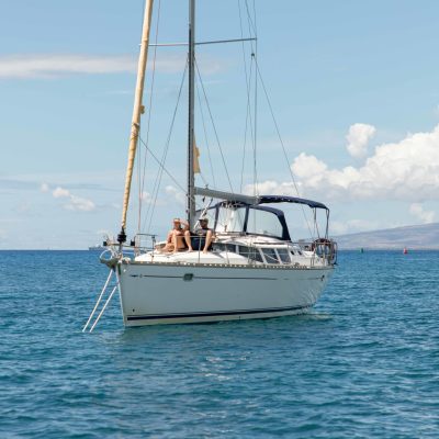 a small boat in a large body of water
