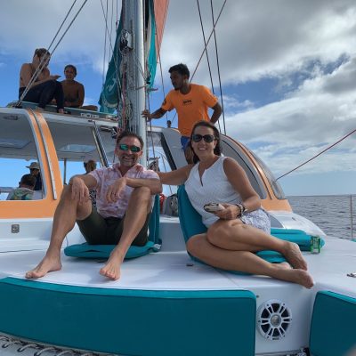 a group of people on a boat in the water