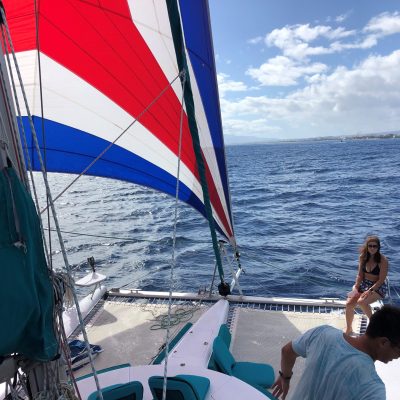a group of people on a boat in the water