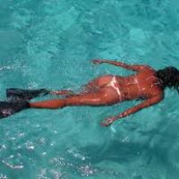 a person swimming in water