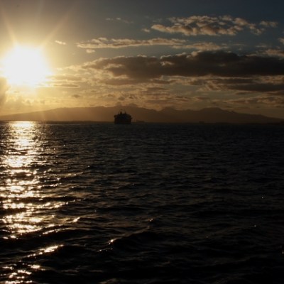 a sunset over a body of water