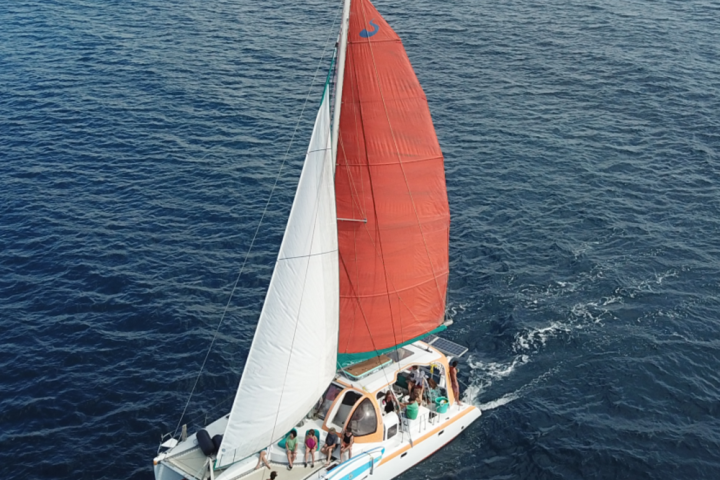 a small boat in a large body of water